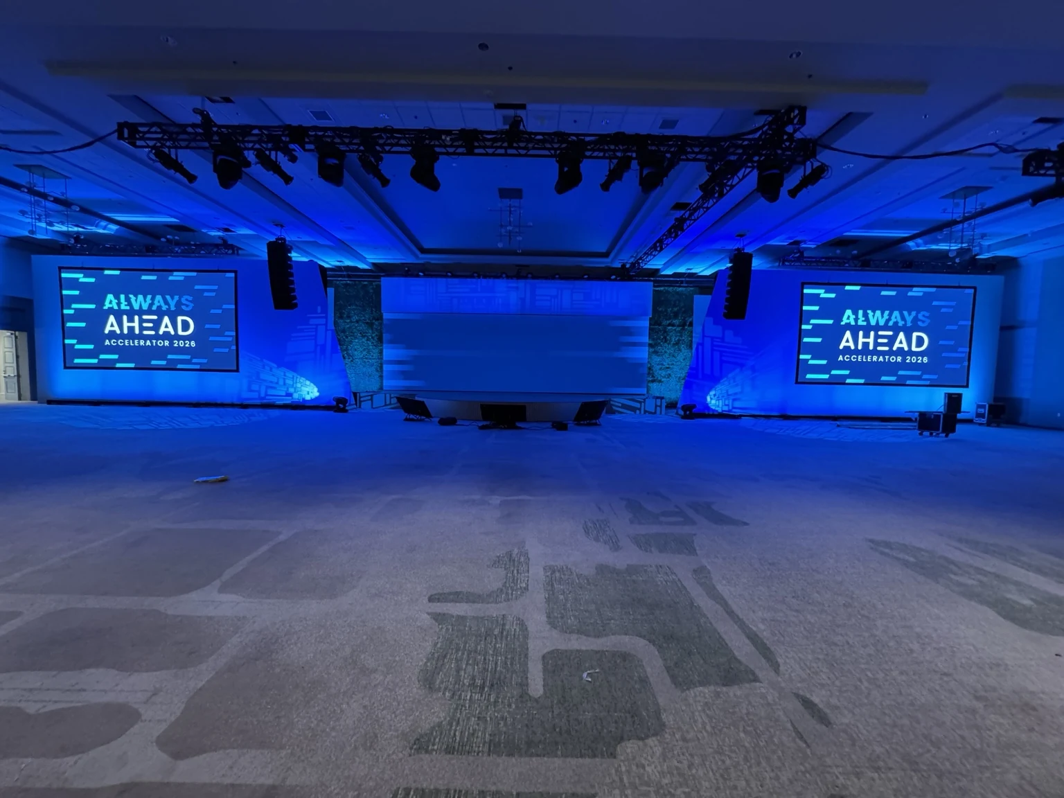 AHEAD Accelerator 2026: blue-lit stage-ready configuration, without a live audience